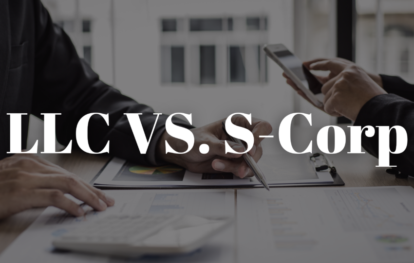 Difference Between LLC and S Corp: Two individuals going over business documents